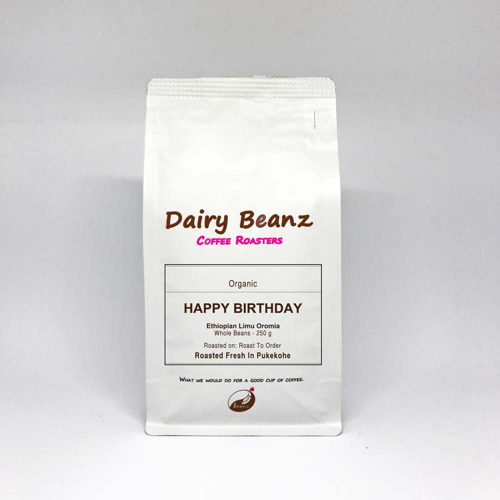 Custom Coffee Gift Pack with "Happy Birthday" label on coffee bags, perfect for gifting.