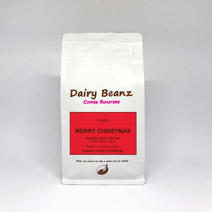 Custom Coffee Gift Pack with "Merry Christmas" label on coffee bags, perfect for gifting.