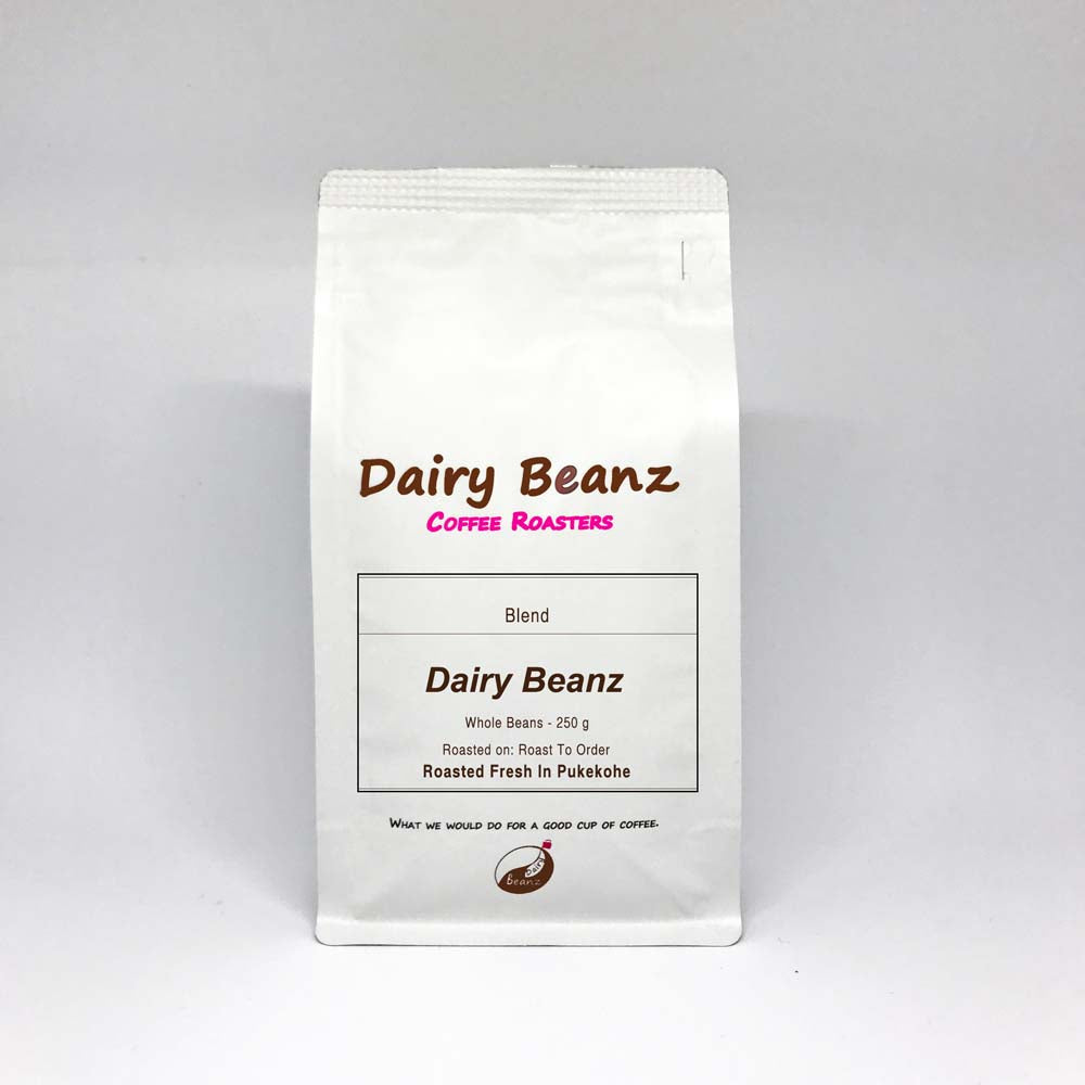 A bag of 'Dairy Beanz' signature espresso blend coffee with simple and elegant packaging design.